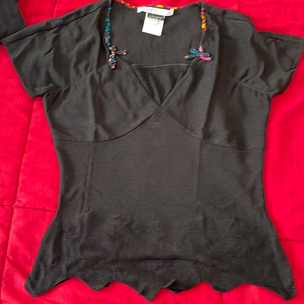 Ungaro Fuschia knit top. Exquisite details.